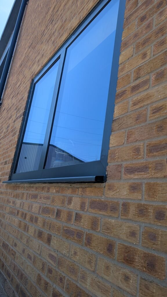 Black aluminium window installed during the REGALTAG office refurbishment in St Neots